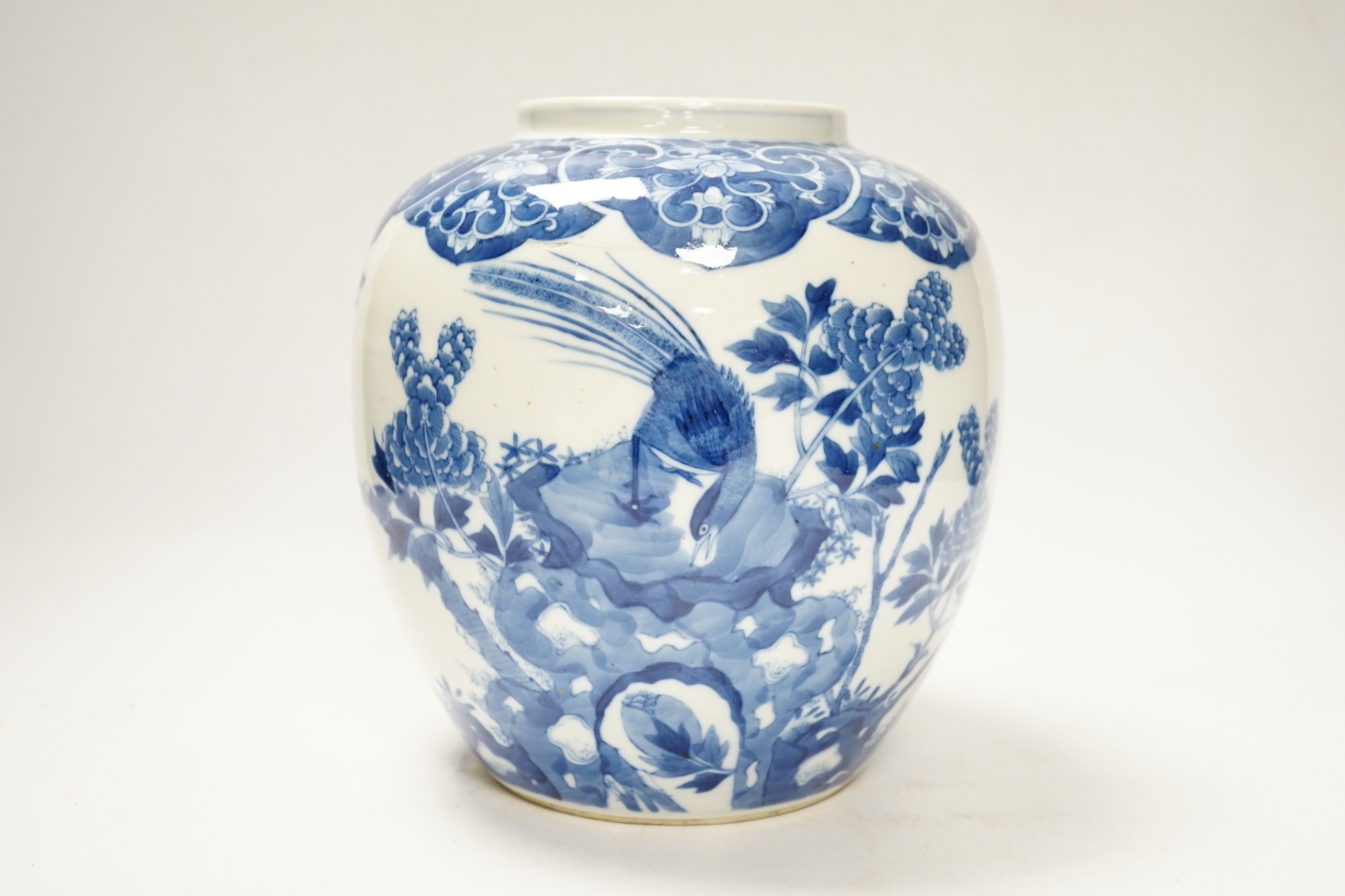 A late 19th Chinese blue and white ginger jar, bearing Kangxi marks, c.1880